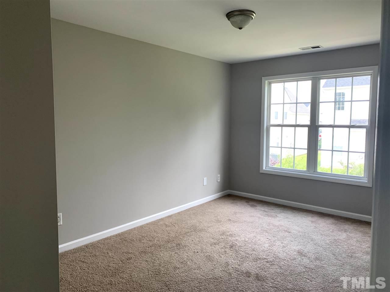 1929 Red Quartz Drive Raleigh, NC 27610 - Photo 7 of 12 large upstairs bedroom with large closet. lots of light!