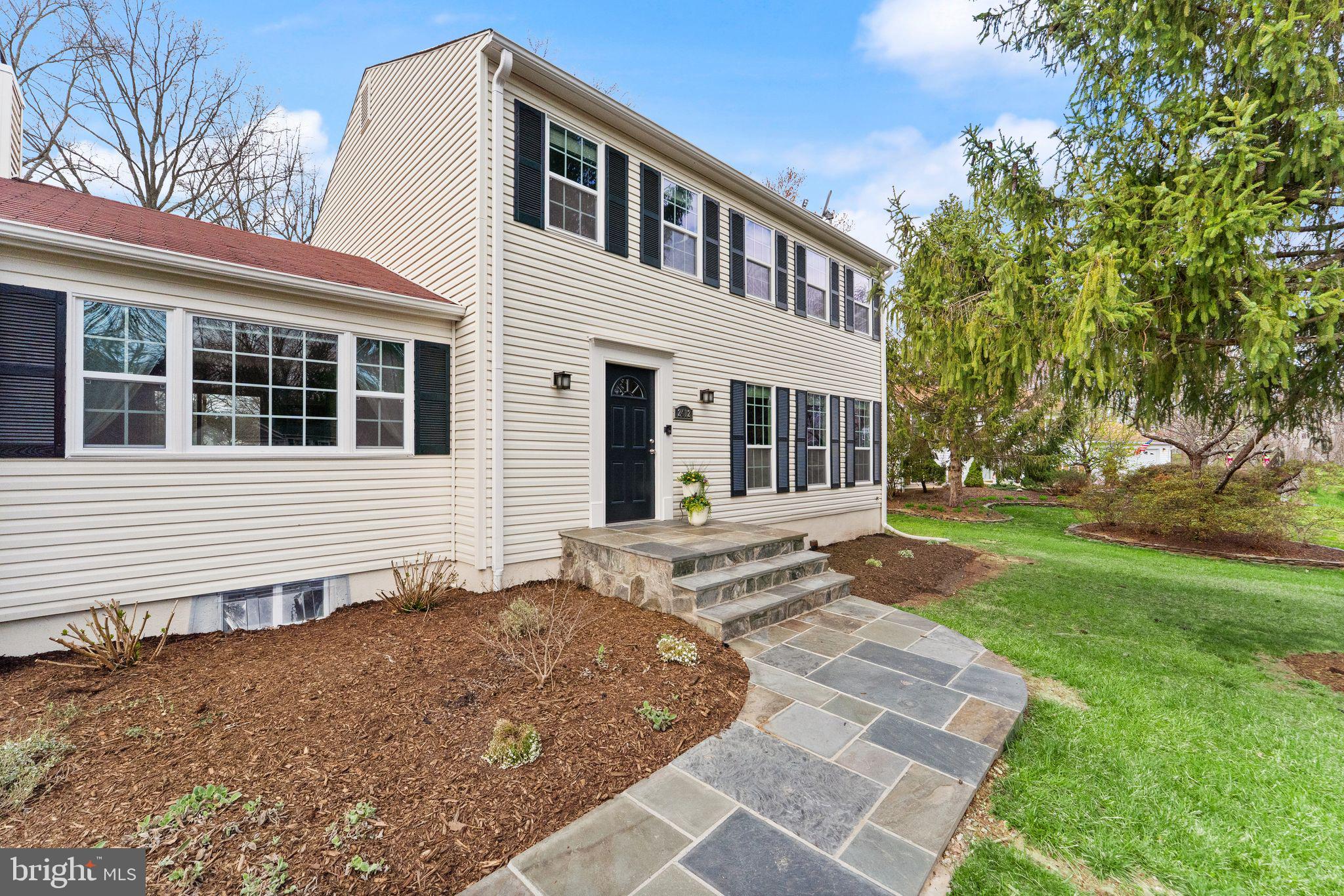 2412 Ivywood Road Reston, VA 20191 - Photo 3 of 63 a front view of a house with garden