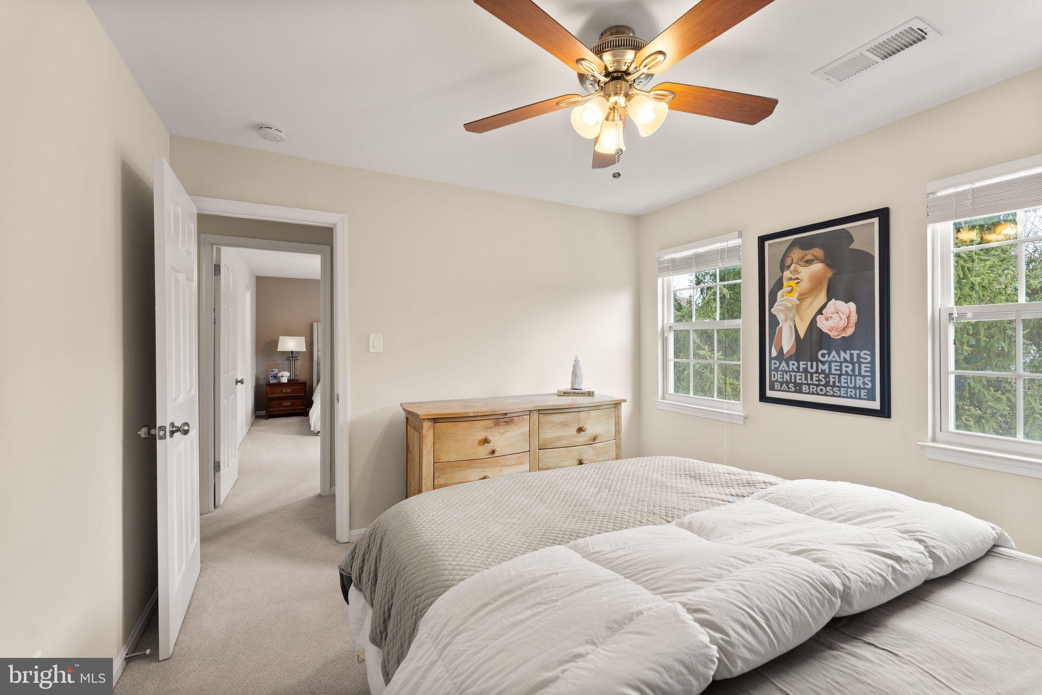 2412 Ivywood Road Reston, VA 20191 - Photo 32 of 63 a bedroom with a large bed and a window