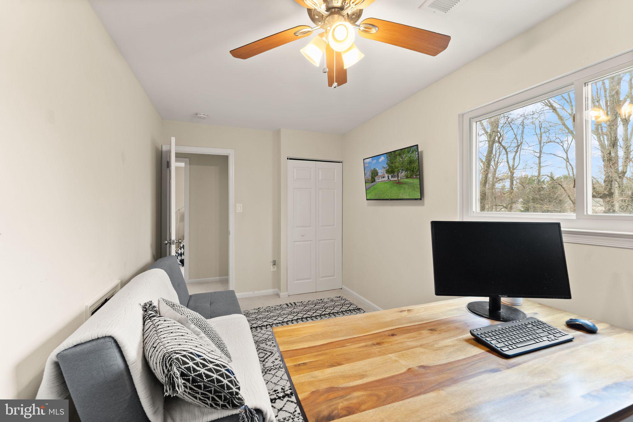 2412 Ivywood Road Reston, VA 20191 - Photo 35 of 63 a bedroom with a bed and a window