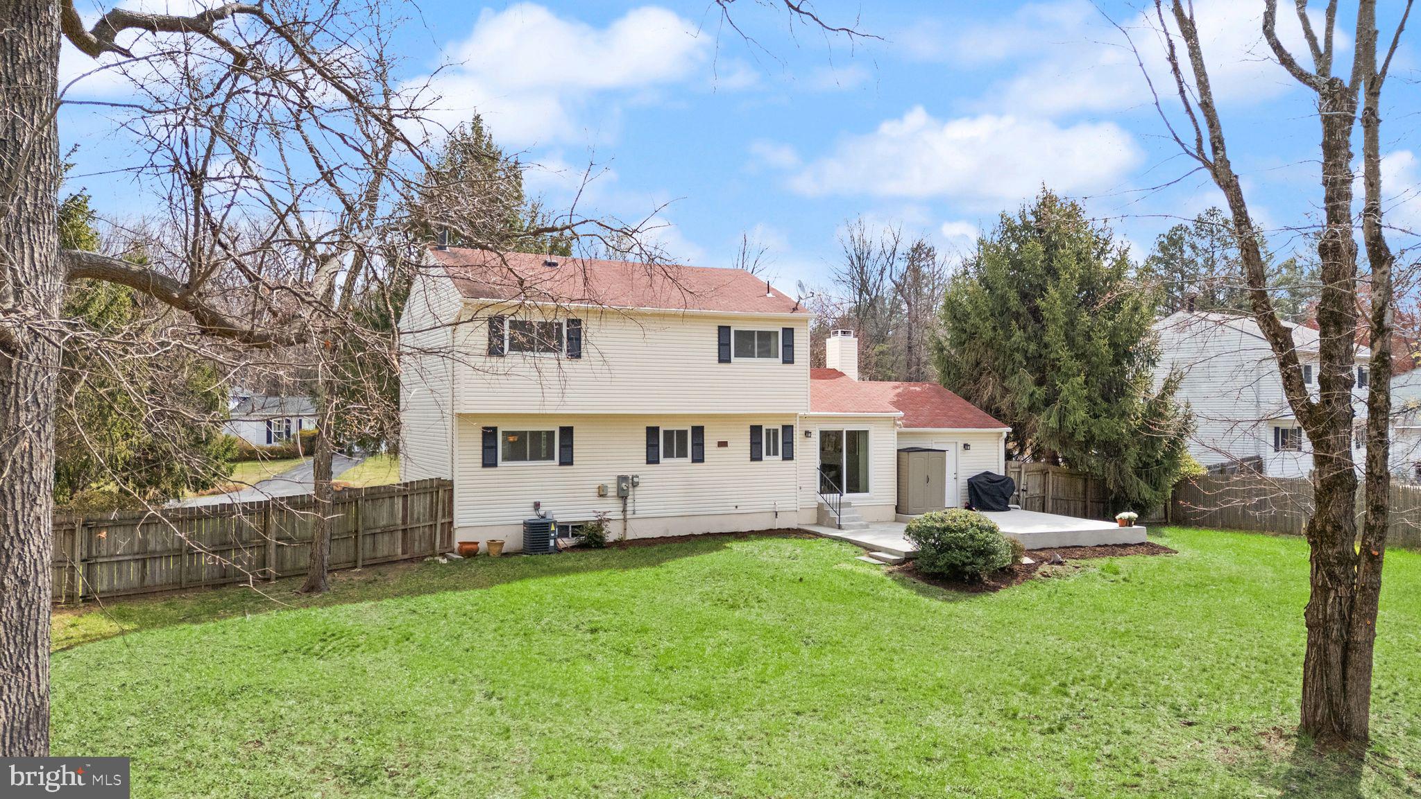 2412 Ivywood Road Reston, VA 20191 - Photo 54 of 63 a front view of house with yard and green space
