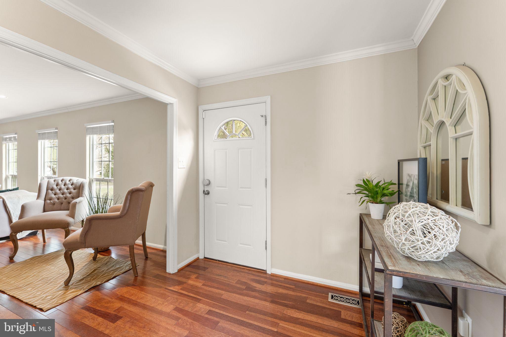 2412 Ivywood Road Reston, VA 20191 - Photo 6 of 63 a view of a livingroom with furniture and wooden floor