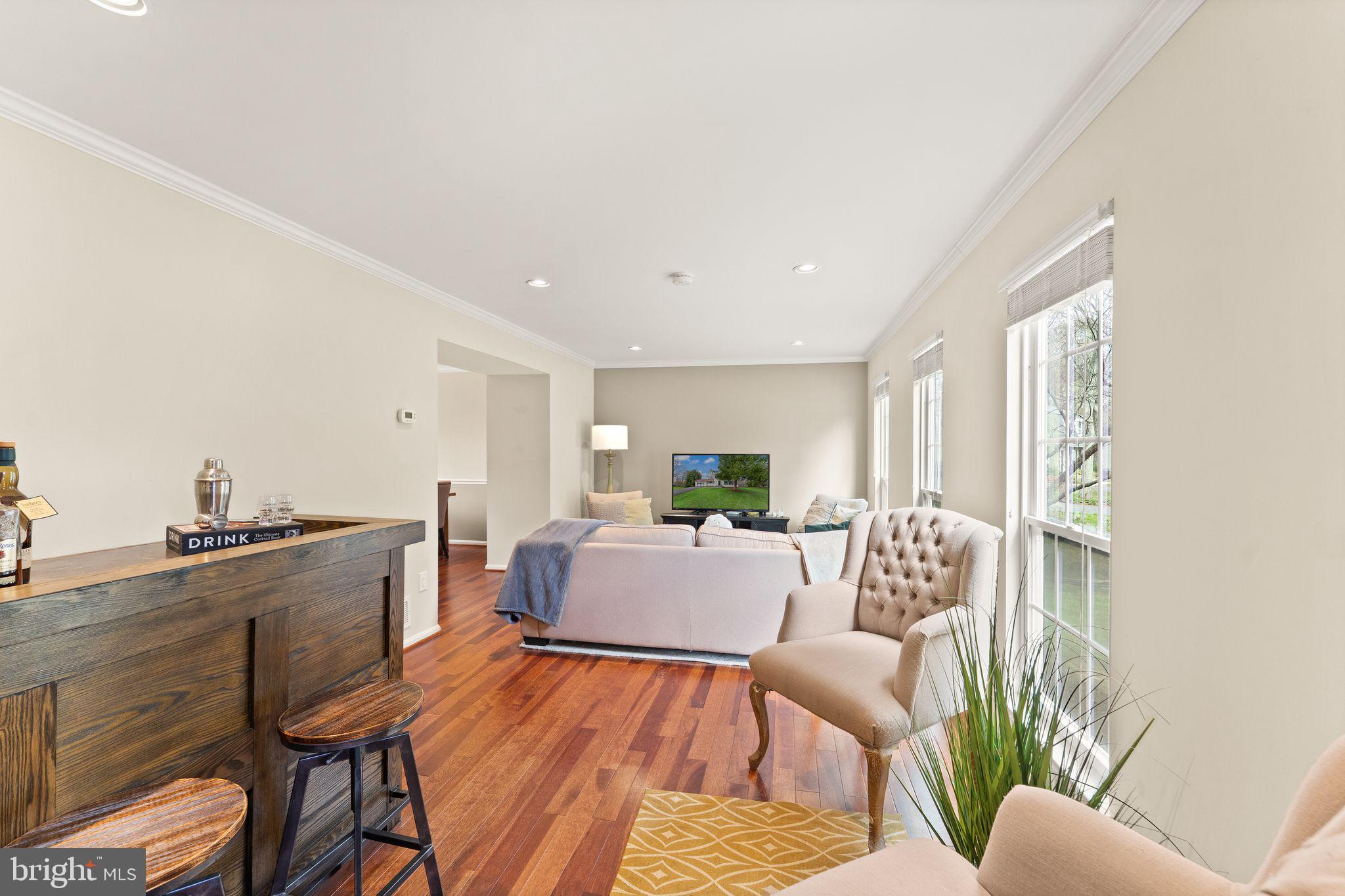 2412 Ivywood Road Reston, VA 20191 - Photo 7 of 63 a living room with furniture and a wooden floor