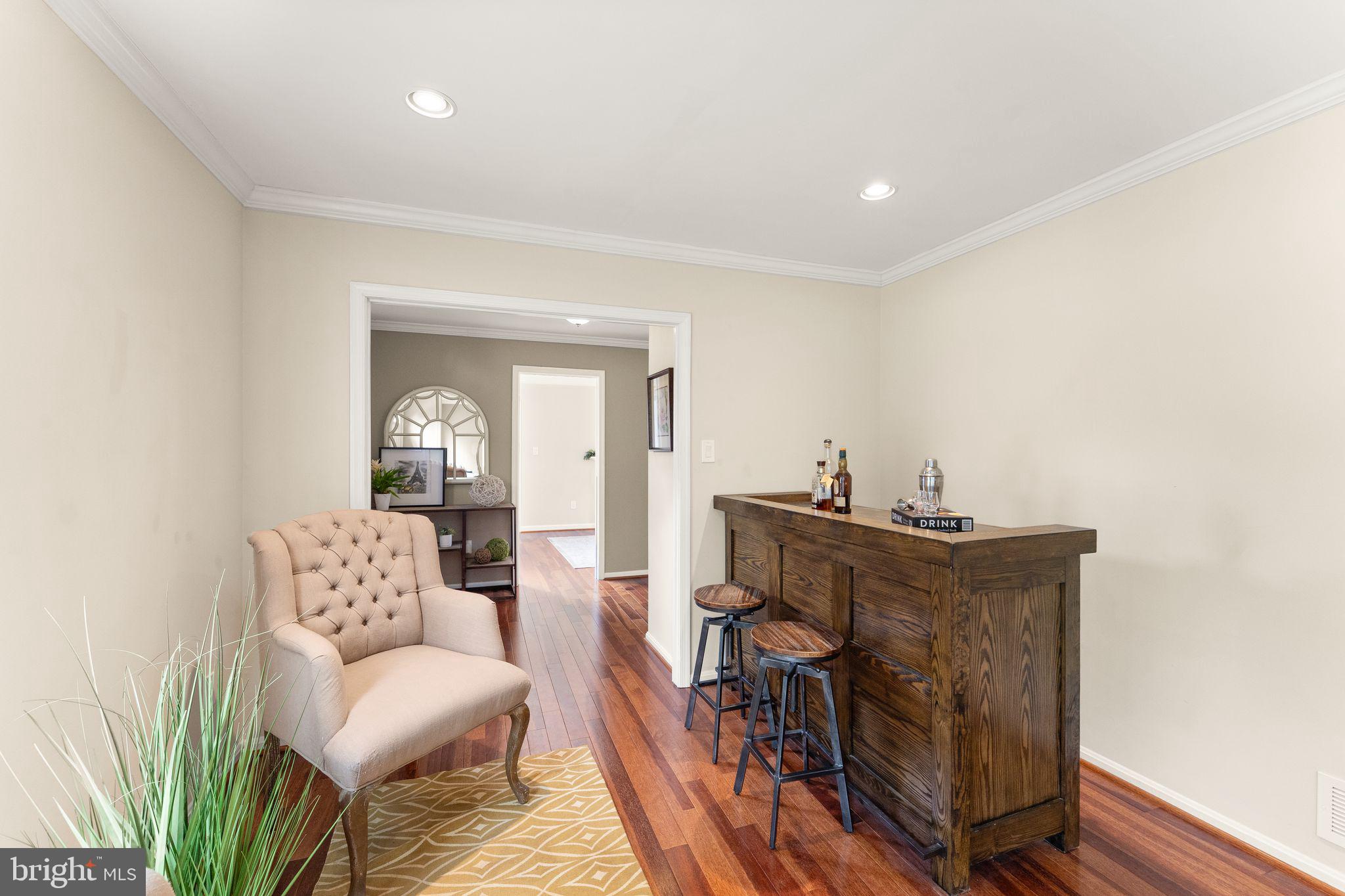 2412 Ivywood Road Reston, VA 20191 - Photo 8 of 63 a living room with furniture and wooden floor
