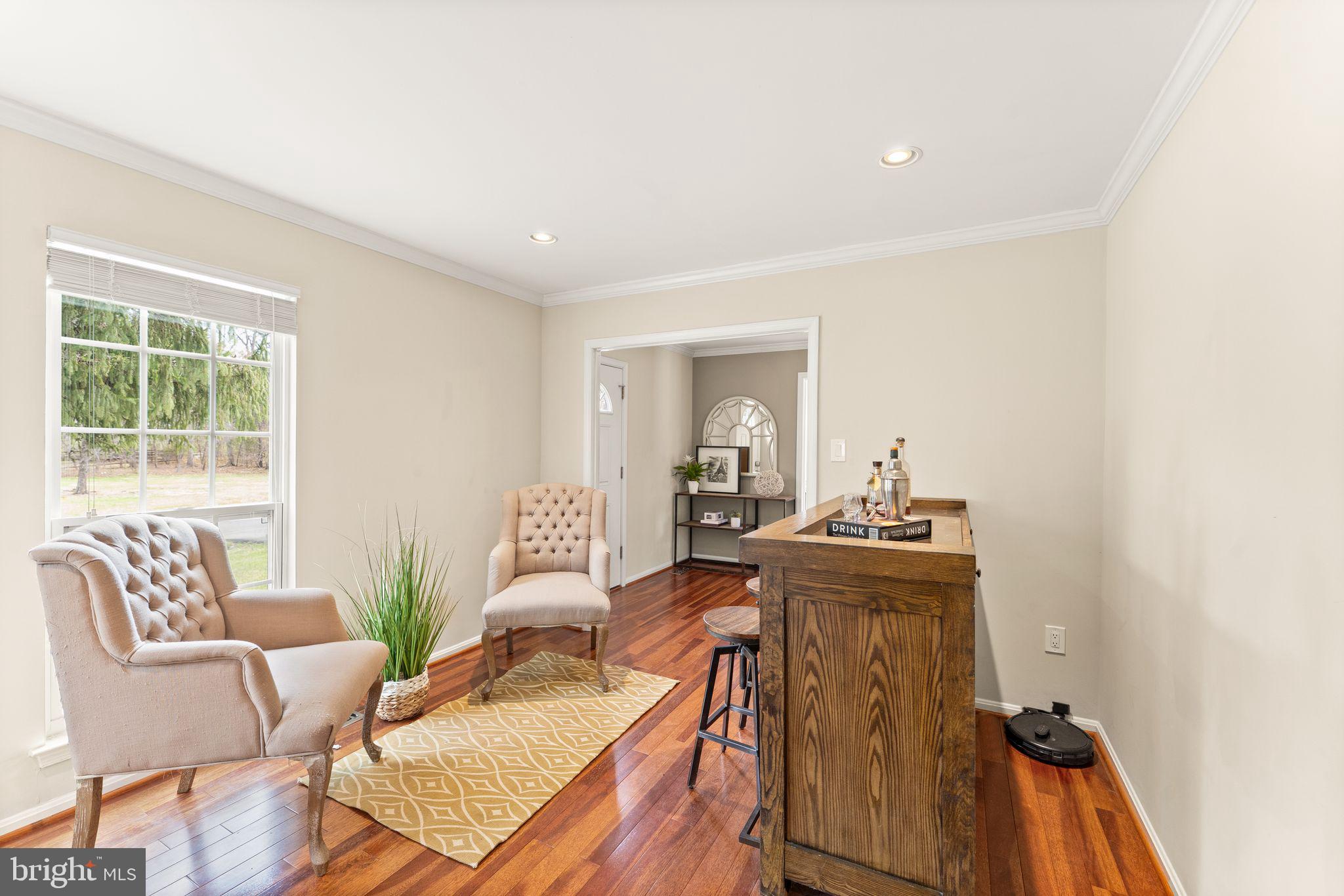 2412 Ivywood Road Reston, VA 20191 - Photo 9 of 63 a living room with furniture and a table