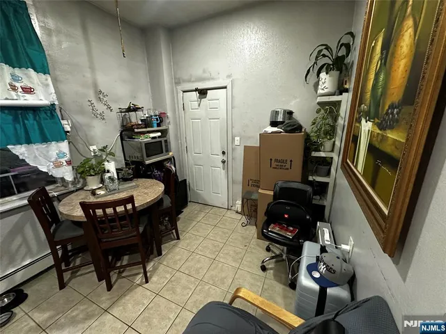 a room with furniture and wooden floor