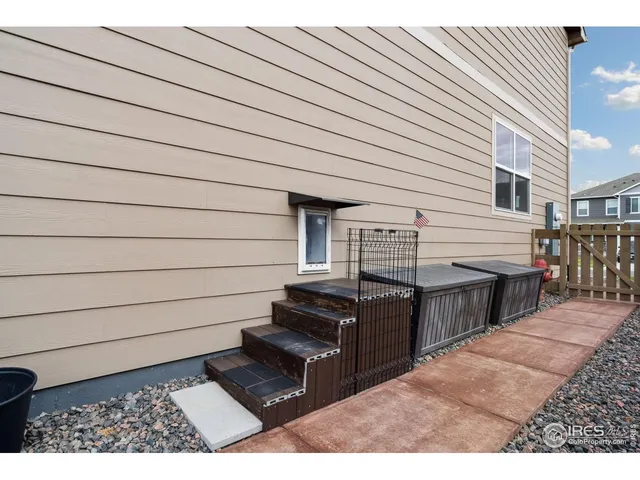 a view of a terrace with wooden walls