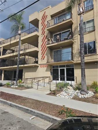 a front view of a building with street