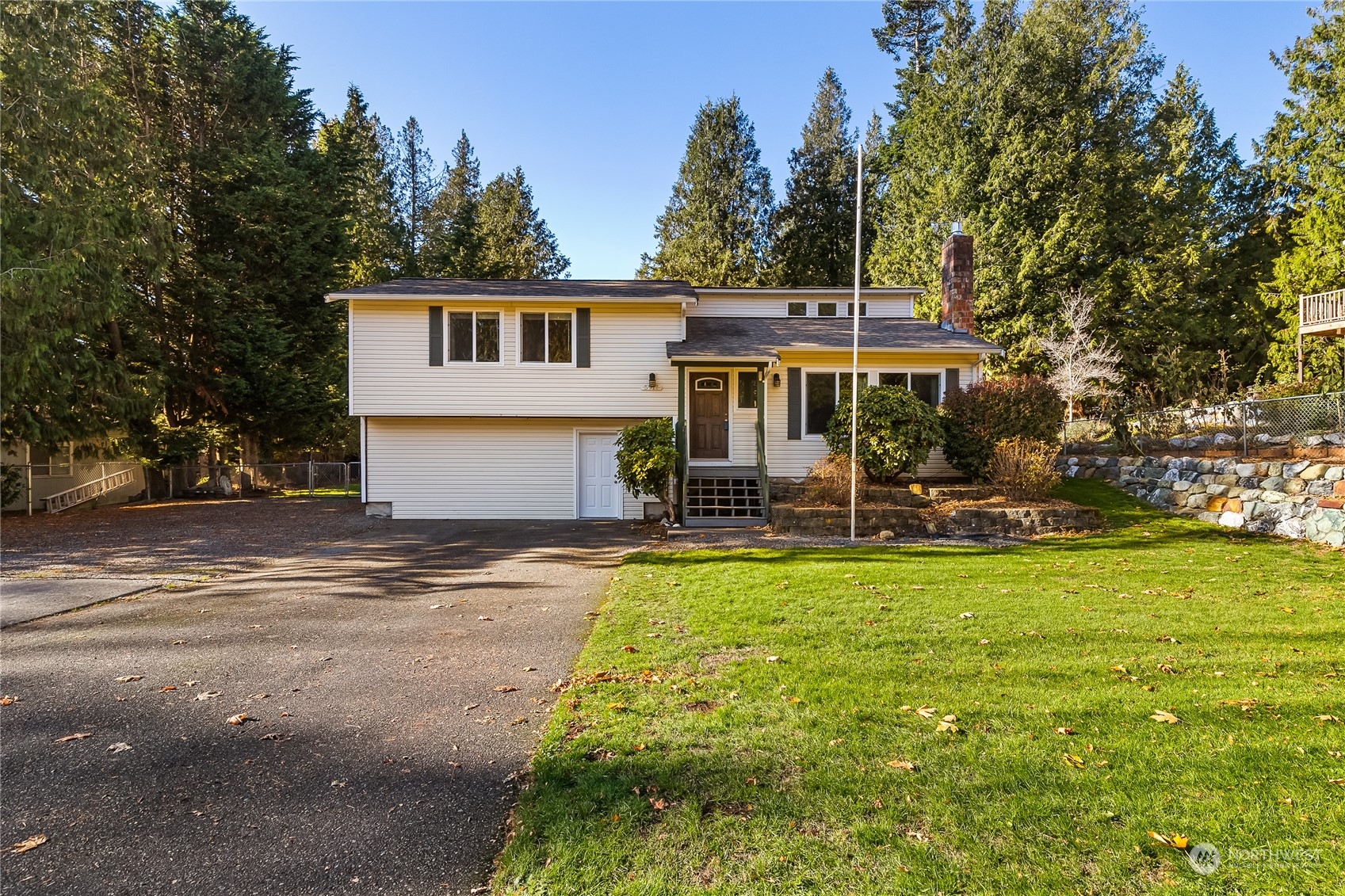 5917 Longdin Road Ferndale, WA 98248 - Photo 1 of 36 a front view of a house with garden