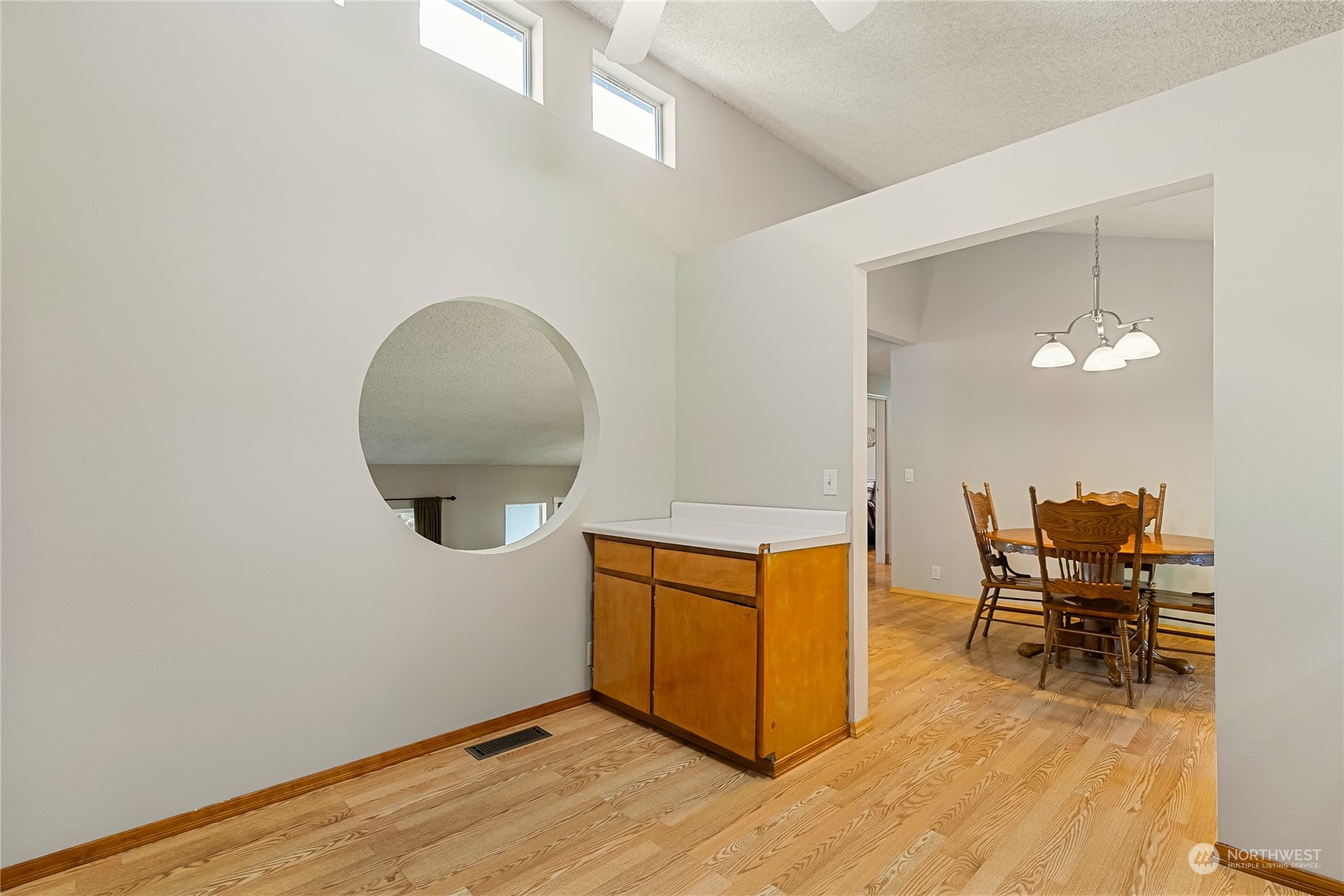 5917 Longdin Road Ferndale, WA 98248 - Photo 14 of 36 an empty room with wooden floor and windows