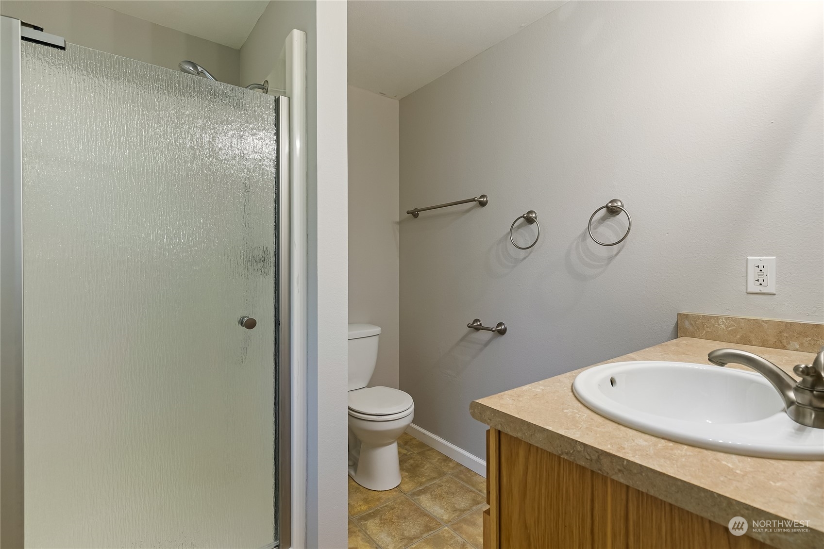 5917 Longdin Road Ferndale, WA 98248 - Photo 17 of 36 a bathroom with a sink toilet and shower
