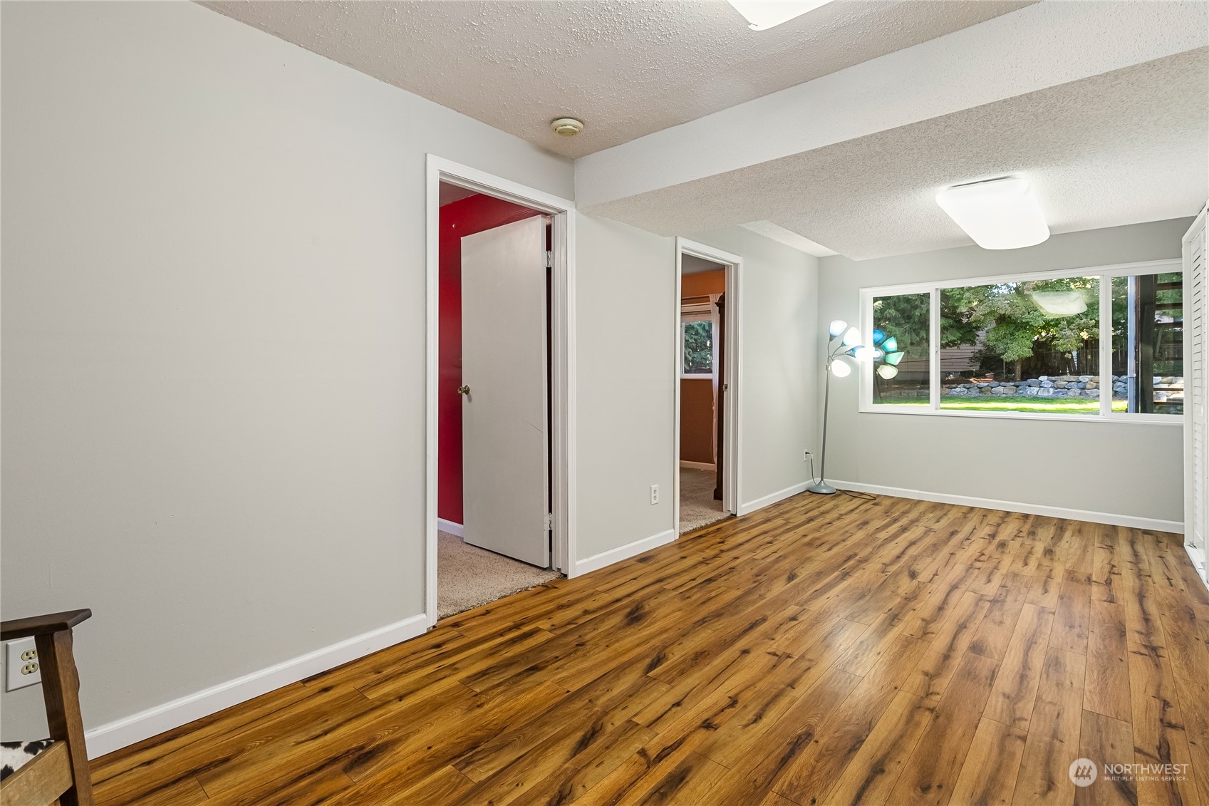 5917 Longdin Road Ferndale, WA 98248 - Photo 23 of 36 a view of empty room with wooden floor and fan