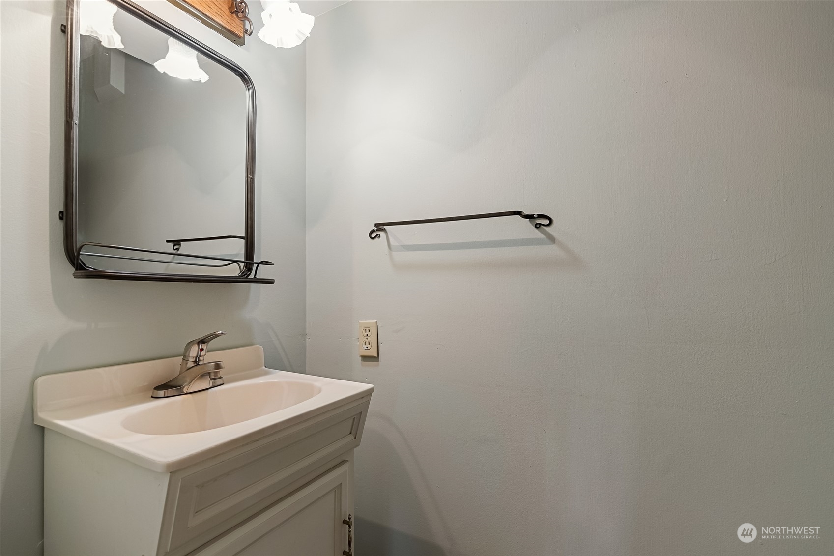 5917 Longdin Road Ferndale, WA 98248 - Photo 25 of 36 a bathroom with a sink and mirror