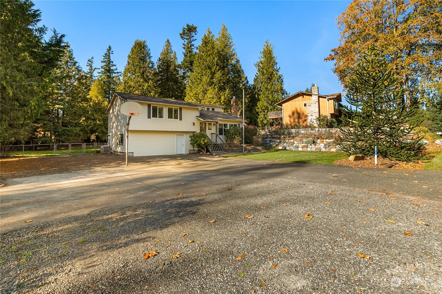 5917 Longdin Road Ferndale, WA 98248 - Photo 3 of 36 a front view of a house with a yard and garage