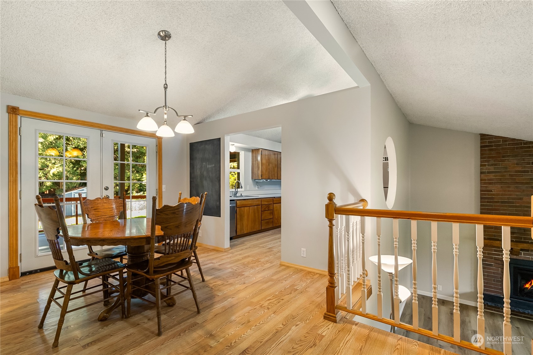 5917 Longdin Road Ferndale, WA 98248 - Photo 8 of 36 a view of a dining room with furniture window and wooden floor