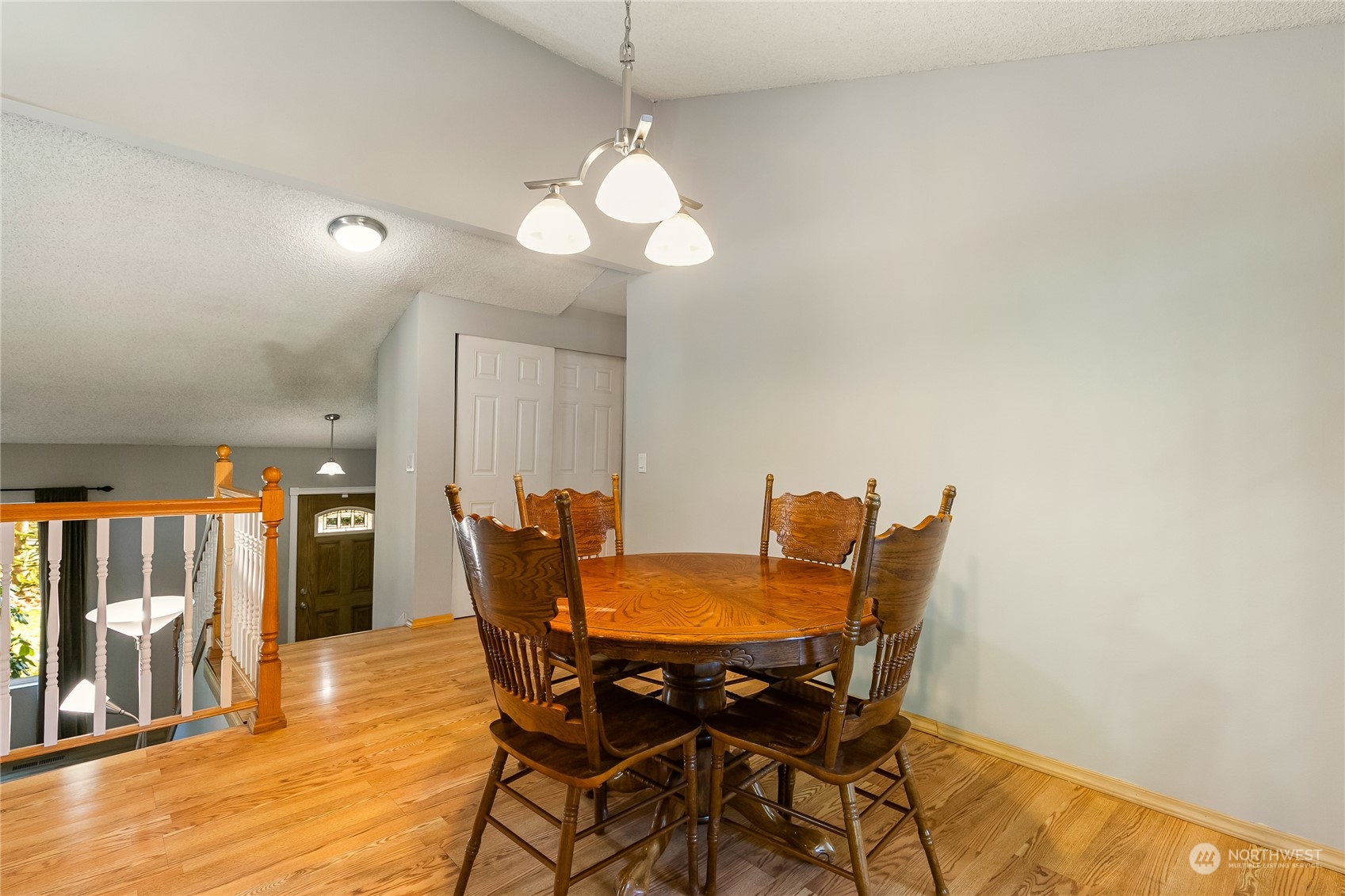 5917 Longdin Road Ferndale, WA 98248 - Photo 9 of 36 a view of a dining room with furniture and wooden floor
