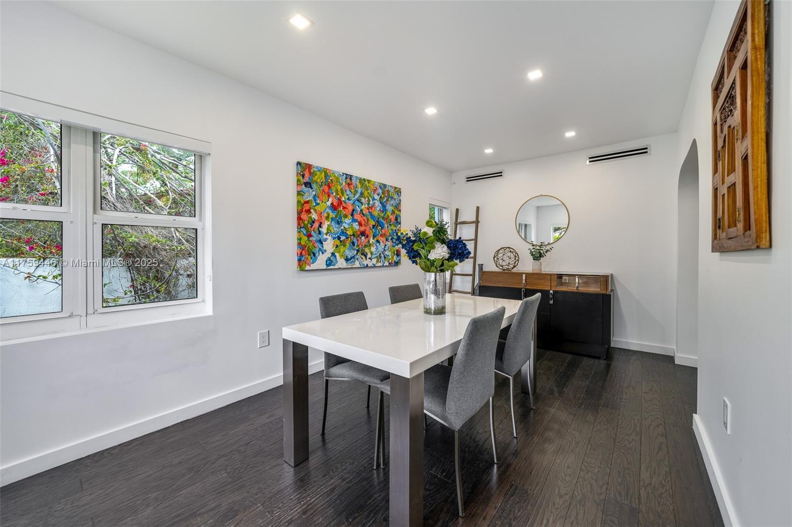 1745 Southwest 10th Street Miami, FL 33135 - Photo 16 of 51 a view of a dining room with furniture and wooden floor