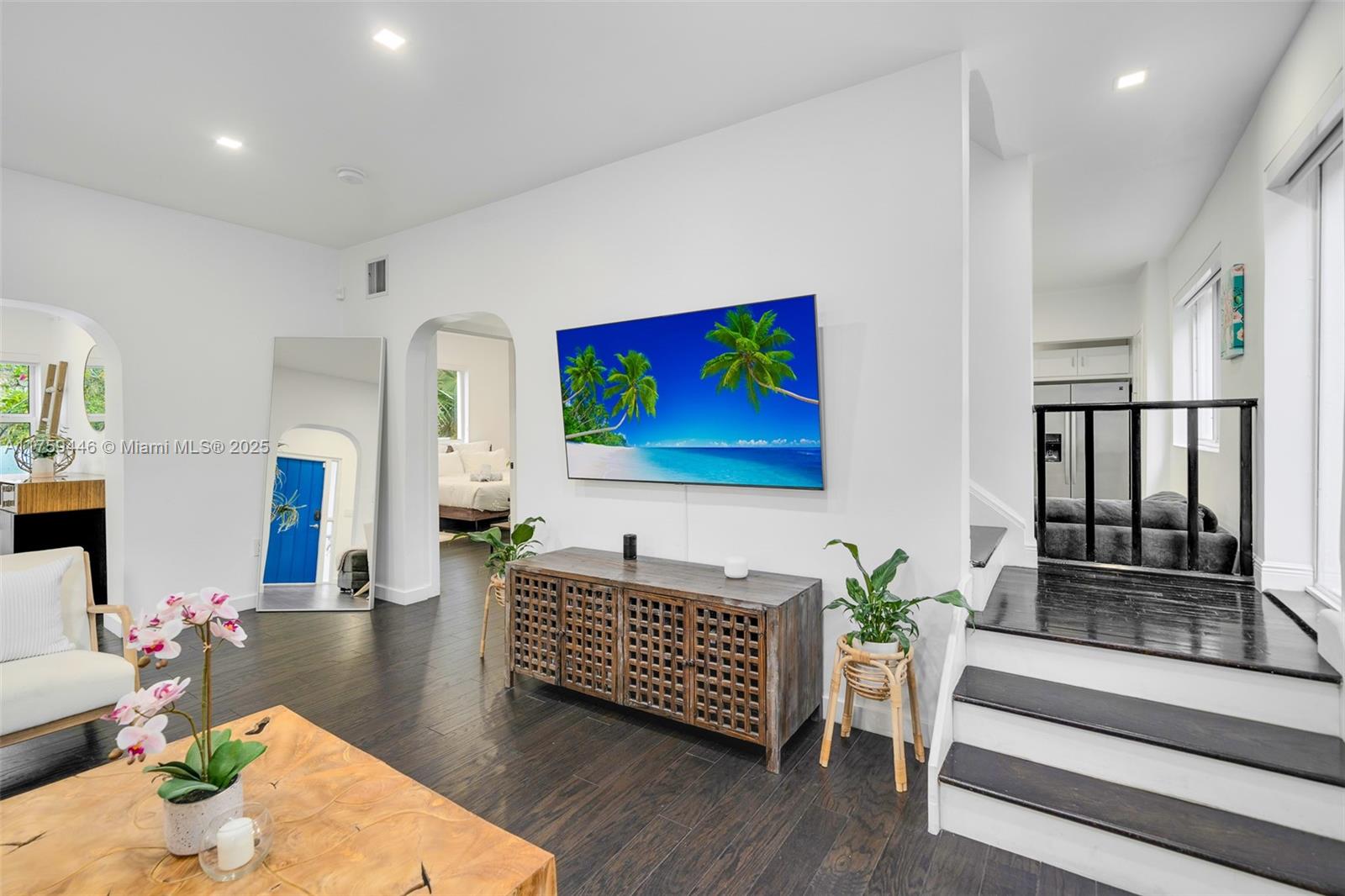 1745 Southwest 10th Street Miami, FL 33135 - Photo 19 of 51 a living room with furniture wooden floor and a flat screen tv