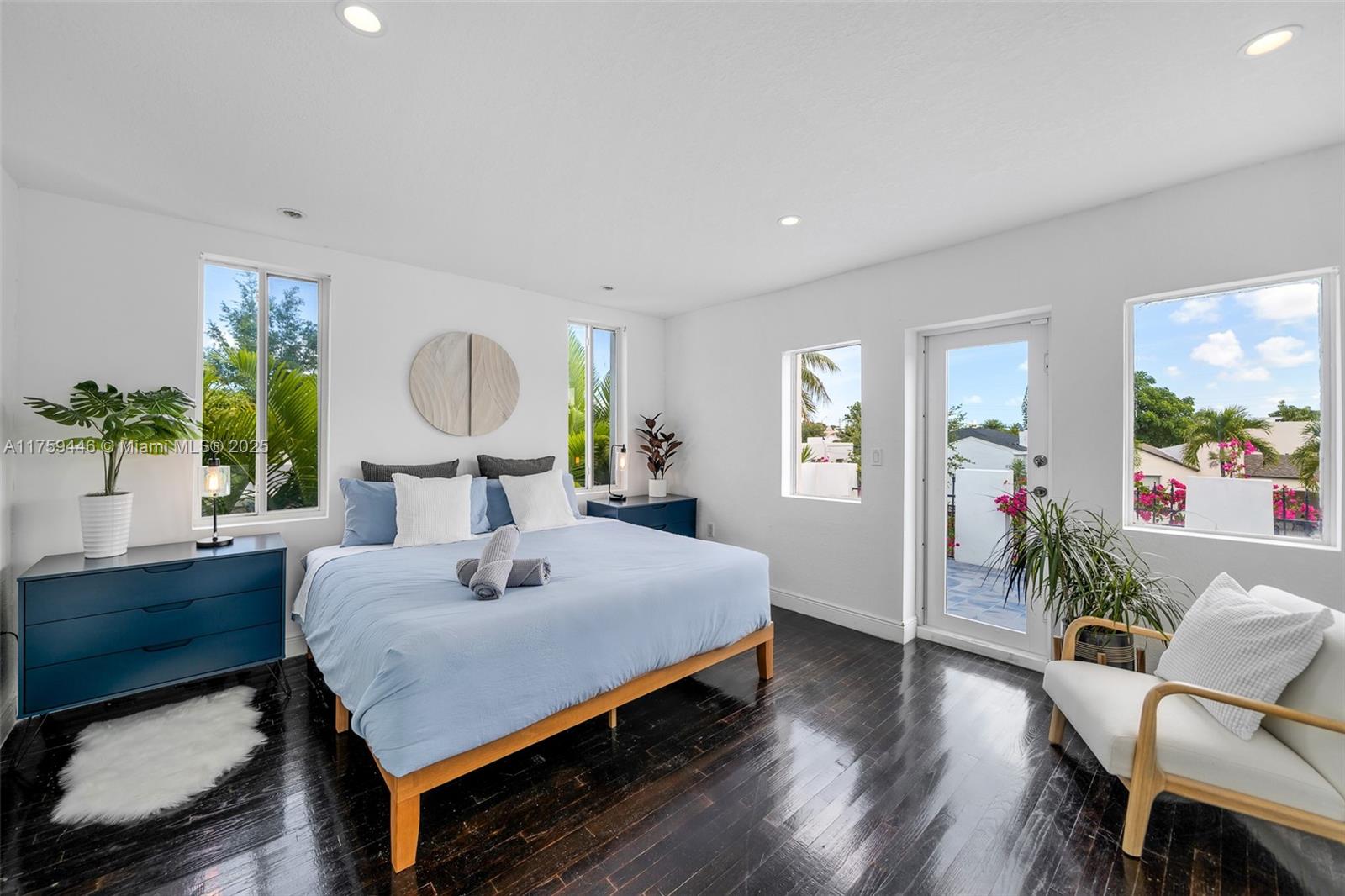 1745 Southwest 10th Street Miami, FL 33135 - Photo 21 of 51 a bed room with furniture and a window