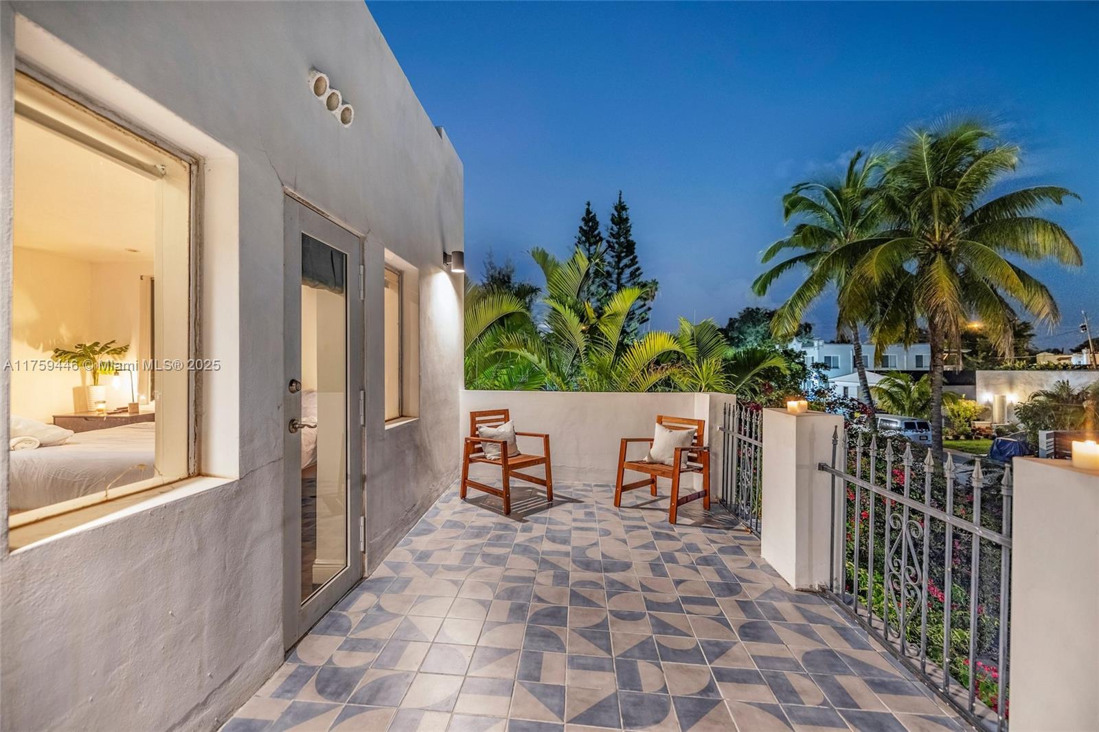 1745 Southwest 10th Street Miami, FL 33135 - Photo 23 of 51 a view of a patio with glass top table and chairs