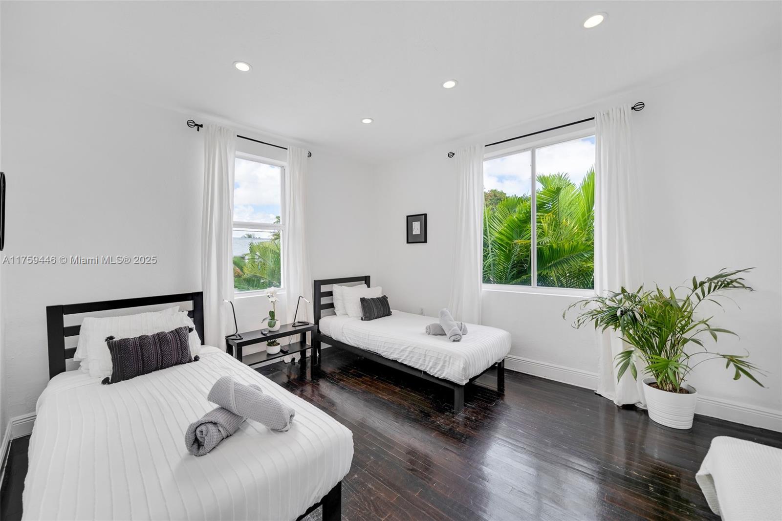 1745 Southwest 10th Street Miami, FL 33135 - Photo 24 of 51 a bedroom with furniture and a large window