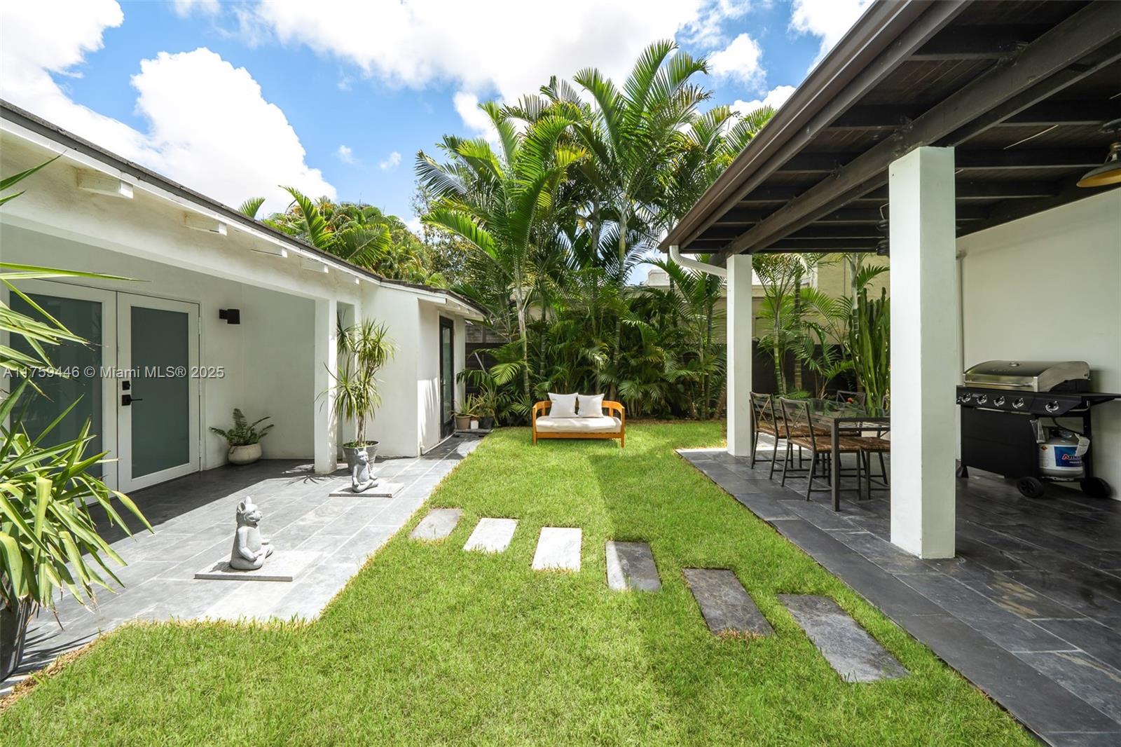 1745 Southwest 10th Street Miami, FL 33135 - Photo 30 of 51 a view of a backyard with a patio