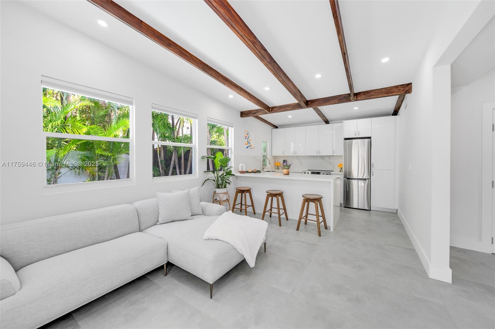 1745 Southwest 10th Street Miami, FL 33135 - Photo 34 of 51 a living room with furniture and a large window
