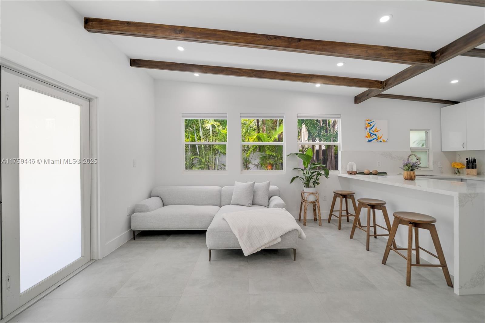 1745 Southwest 10th Street Miami, FL 33135 - Photo 35 of 51 a living room with furniture and a large window