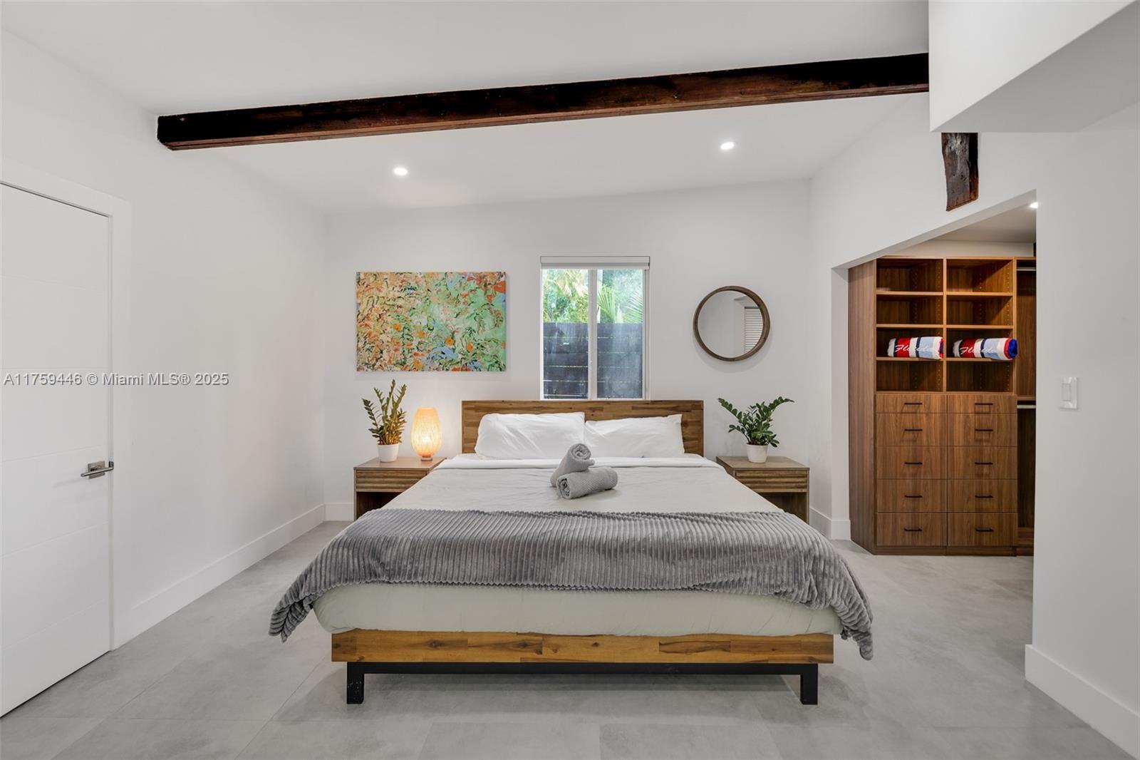 1745 Southwest 10th Street Miami, FL 33135 - Photo 37 of 51 a bedroom with a bed and window