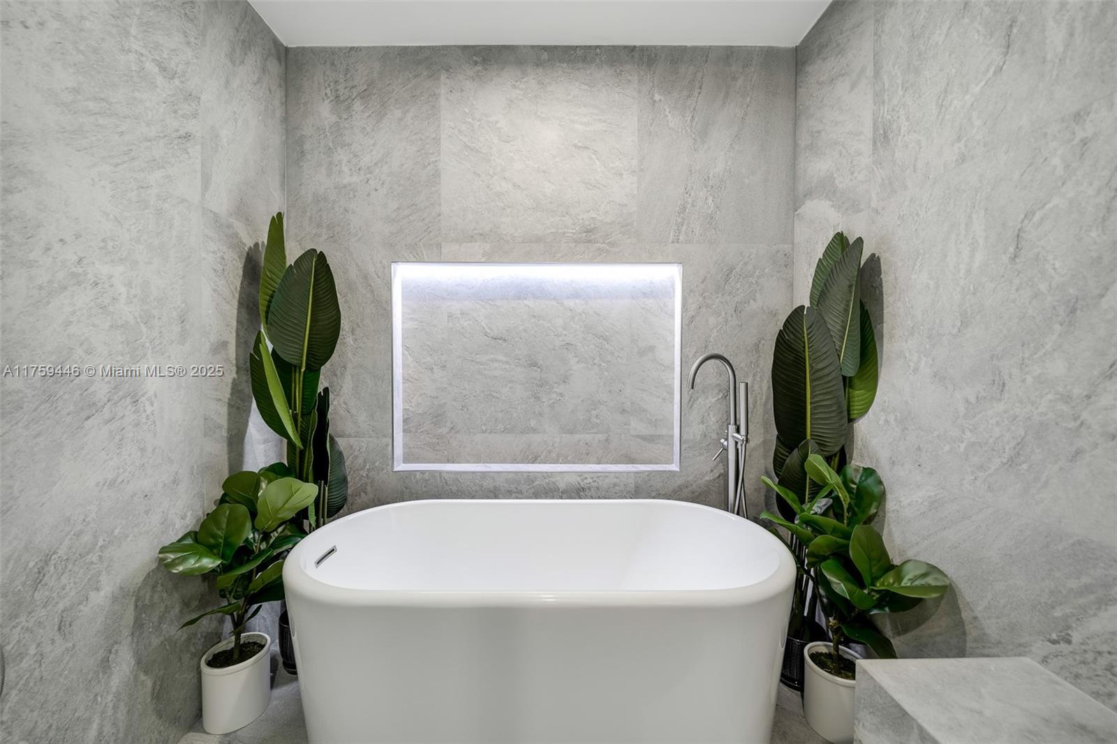 1745 Southwest 10th Street Miami, FL 33135 - Photo 41 of 51 a white bath tub sitting in a bathroom