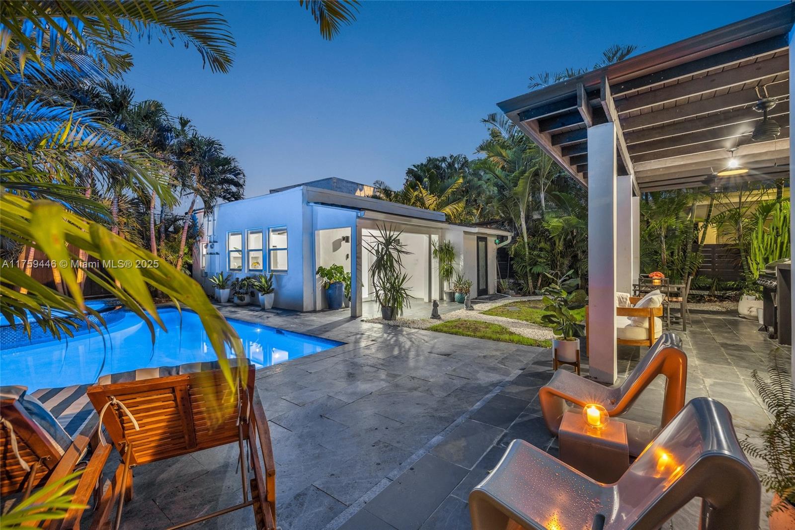 1745 Southwest 10th Street Miami, FL 33135 - Photo 45 of 51 a view of swimming pool with lounge chairs in patio