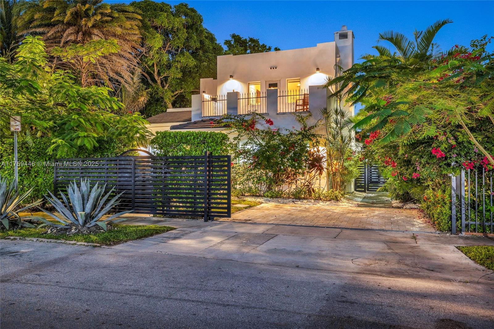 1745 Southwest 10th Street Miami, FL 33135 - Photo 47 of 51 a view of a house with a yard and potted plants