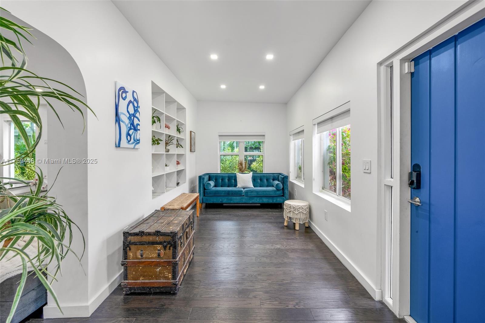 1745 Southwest 10th Street Miami, FL 33135 - Photo 6 of 51 a living room with furniture and a gate