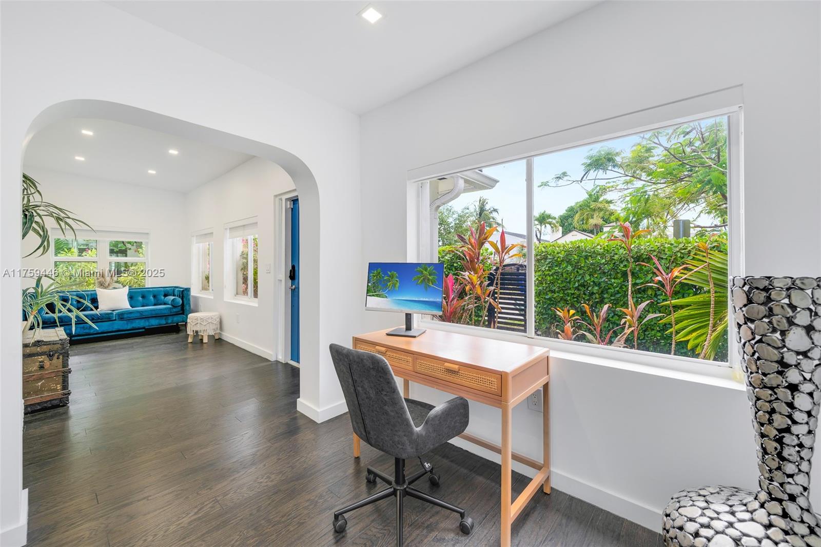 1745 Southwest 10th Street Miami, FL 33135 - Photo 8 of 51 a dining room with furniture and a wooden floor