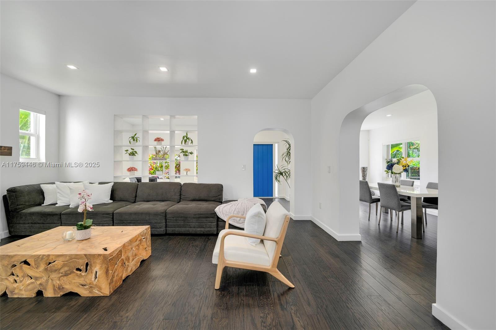 1745 Southwest 10th Street Miami, FL 33135 - Photo 10 of 51 a living room with furniture and a wooden floor