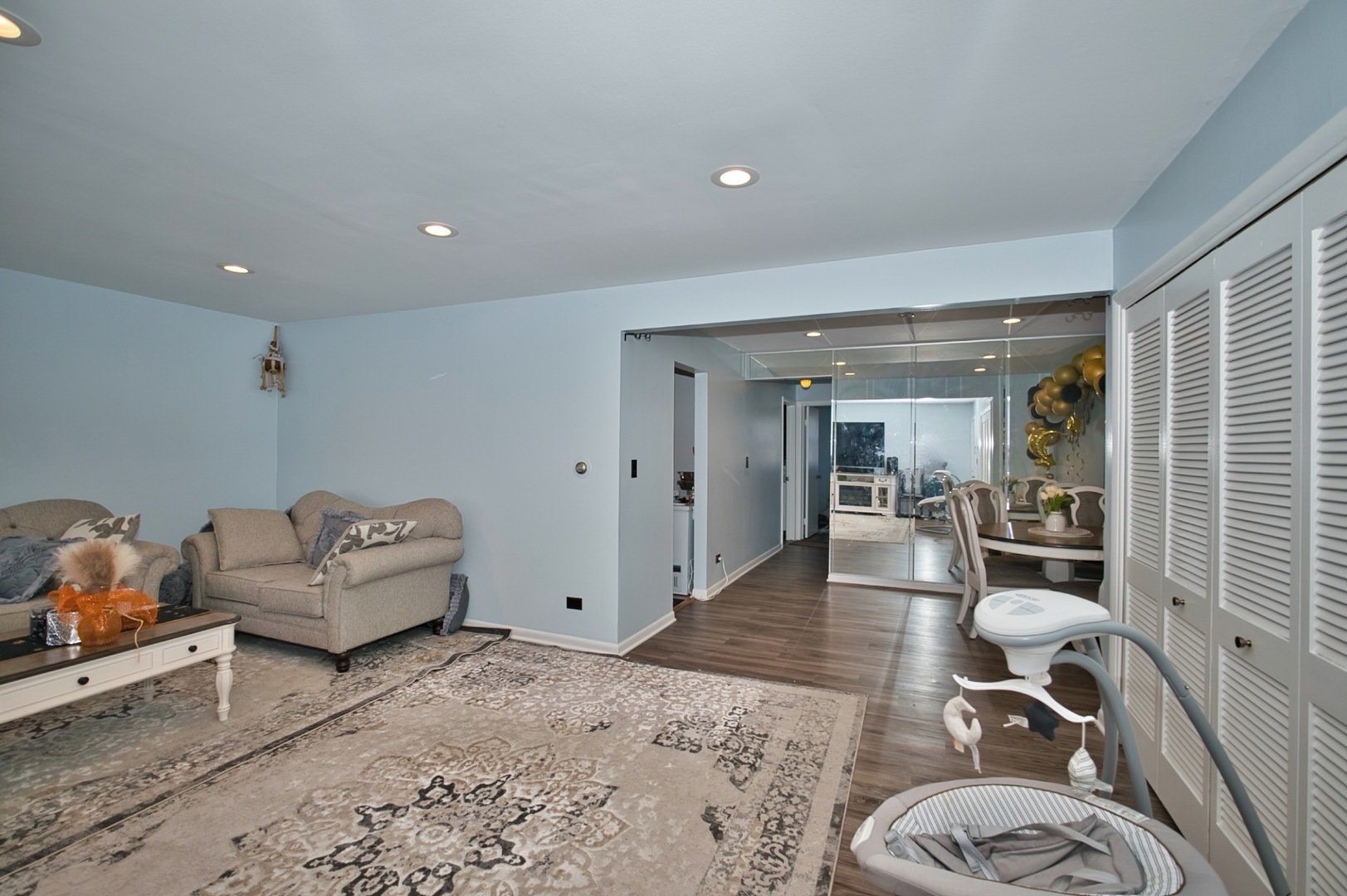 1428 West Fargo Avenue, Unit 303 Chicago, IL 60626 - Photo 12 of 28 a living room with furniture and a wooden floor