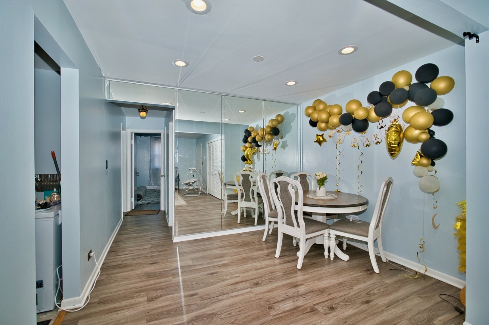 1428 West Fargo Avenue, Unit 303 Chicago, IL 60626 - Photo 15 of 28 a dining room with furniture and wooden floor