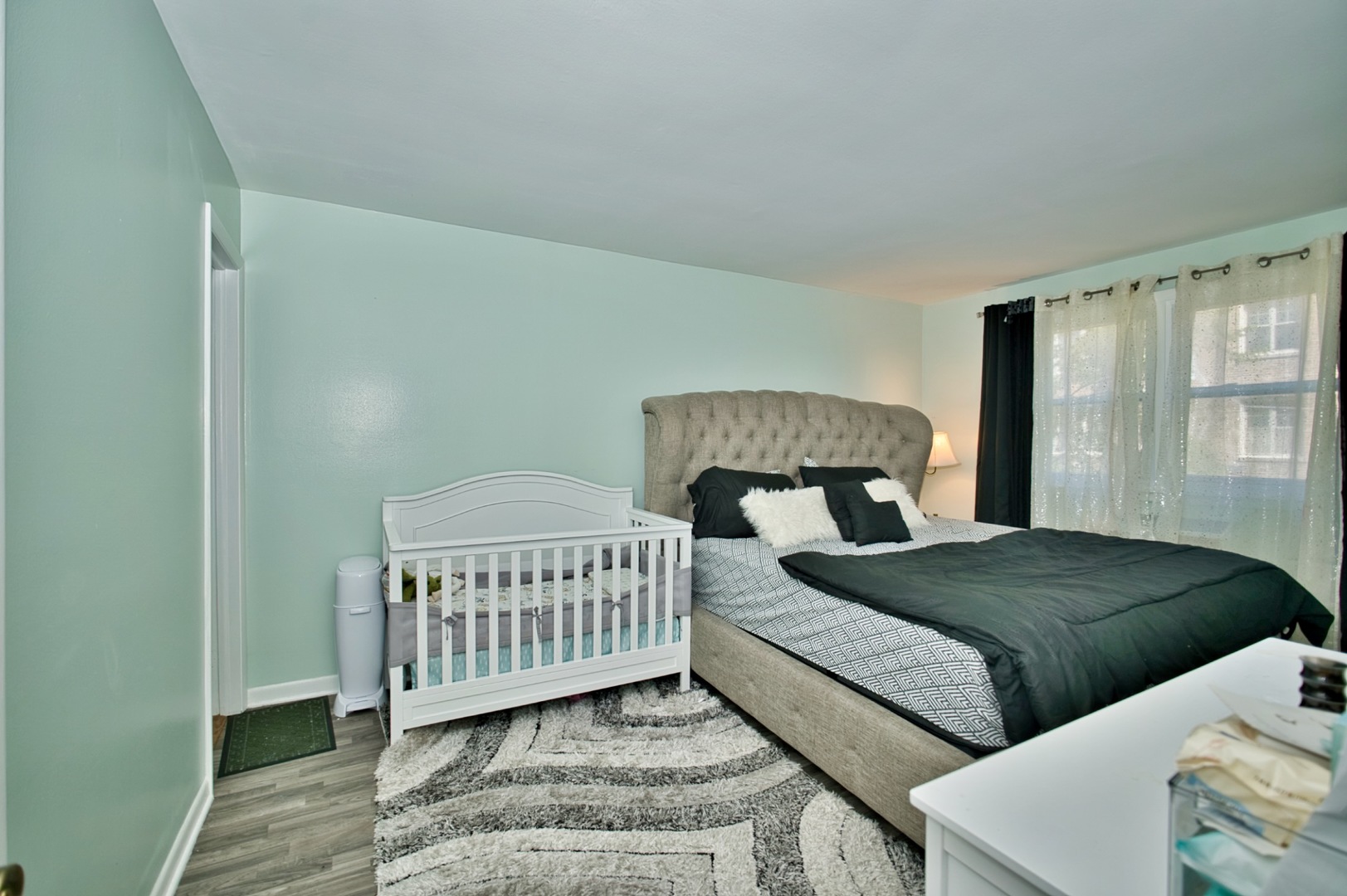 1428 West Fargo Avenue, Unit 303 Chicago, IL 60626 - Photo 25 of 28 a bedroom with two beds and window