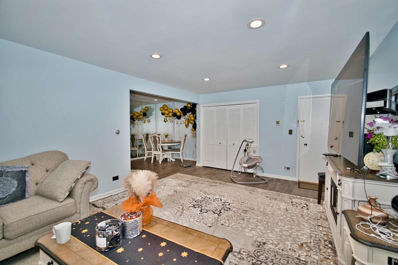 1428 West Fargo Avenue, Unit 303 Chicago, IL 60626 - Photo 7 of 28 a living room with furniture gym equipment and a rug