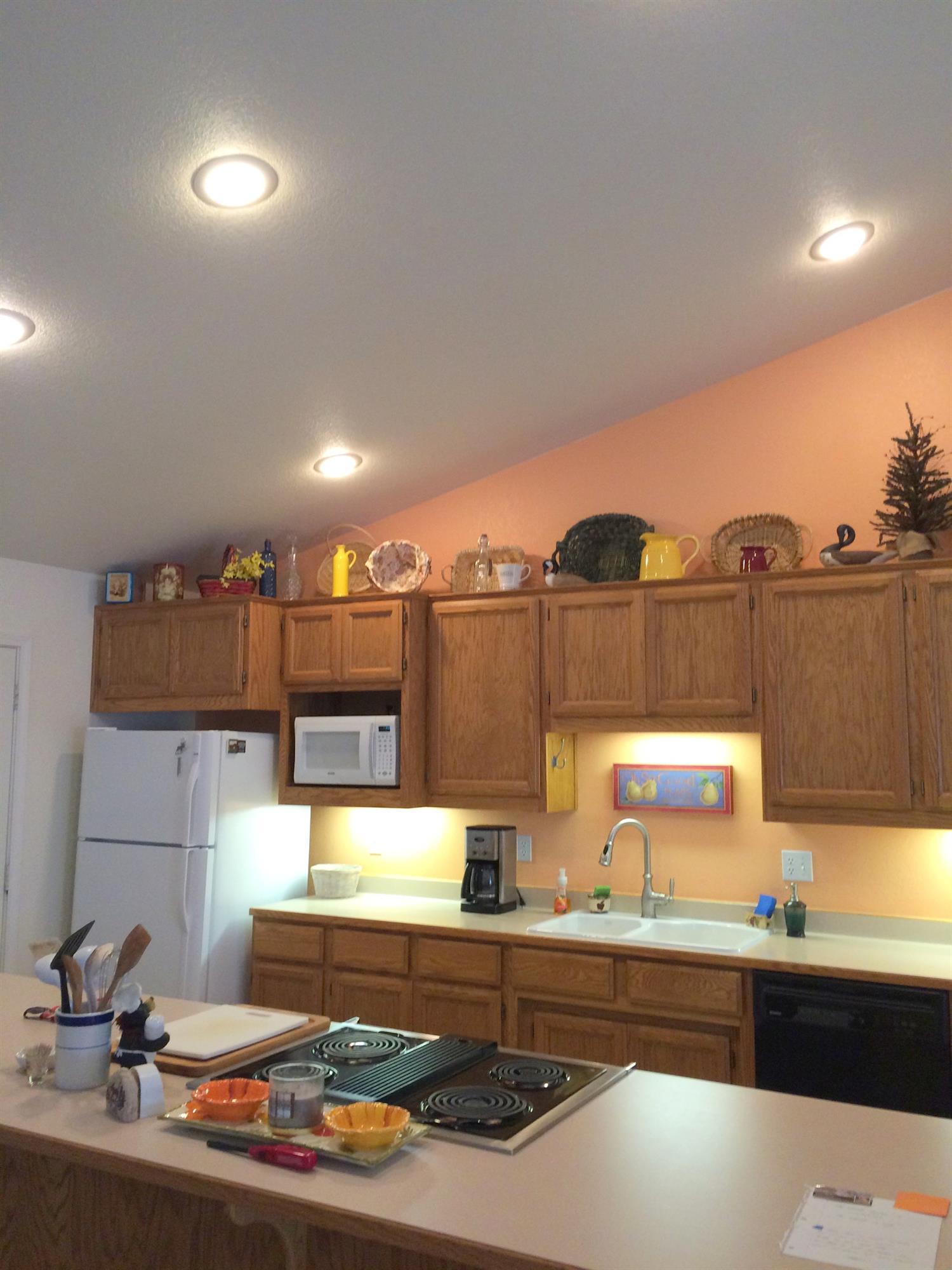 435 South Old Stage Road Cave Junction, OR 97523 - Photo 3 of 22 Bright, cheery kitchen, lots of canned l