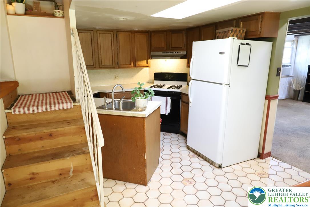 820 Walton Street Bethlehem, PA 18018 - Photo 3 of 18 a refrigerator freezer sitting inside of a kitchen