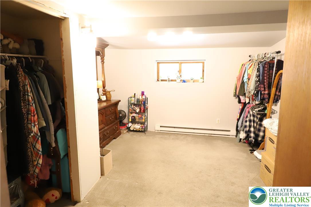 820 Walton Street Bethlehem, PA 18018 - Photo 8 of 18 a view of walk in closet with clothes and shoes