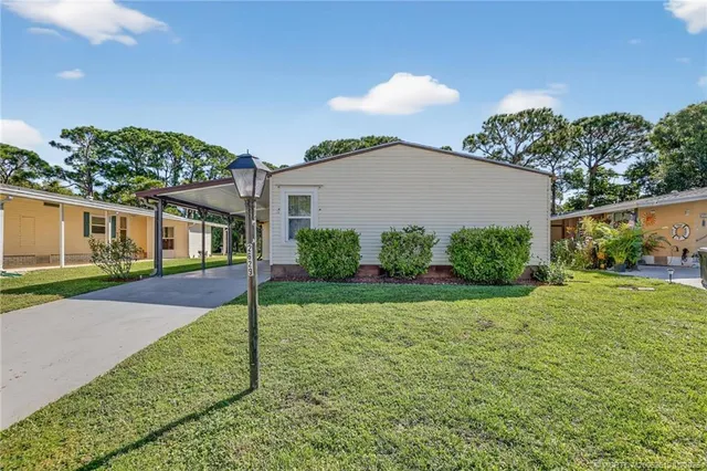 a view of a back yard of the house