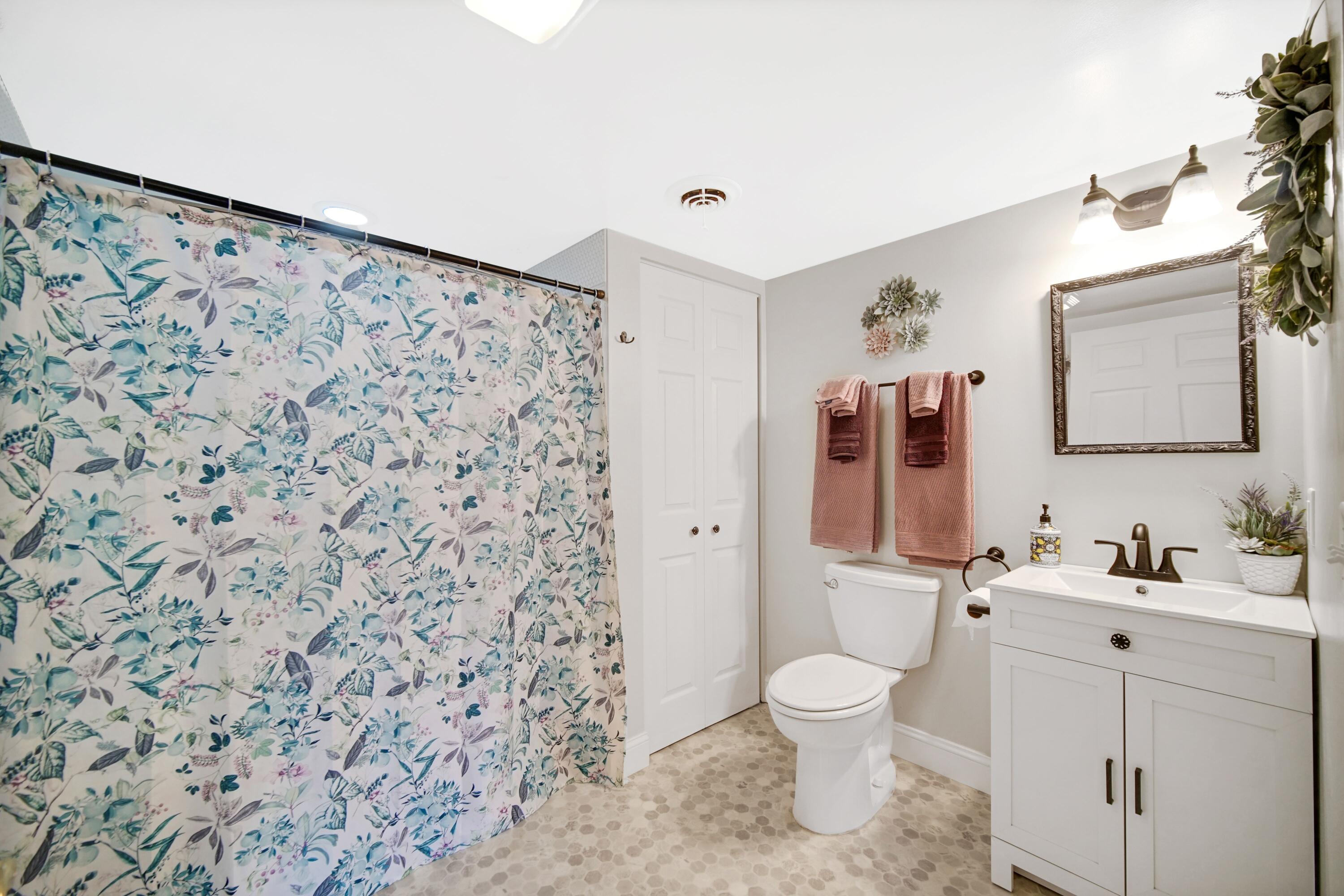 1441 Brandywine Road Crown Point, IN 46307 - Photo 19 of 24 a bathroom with a toilet sink and mirror