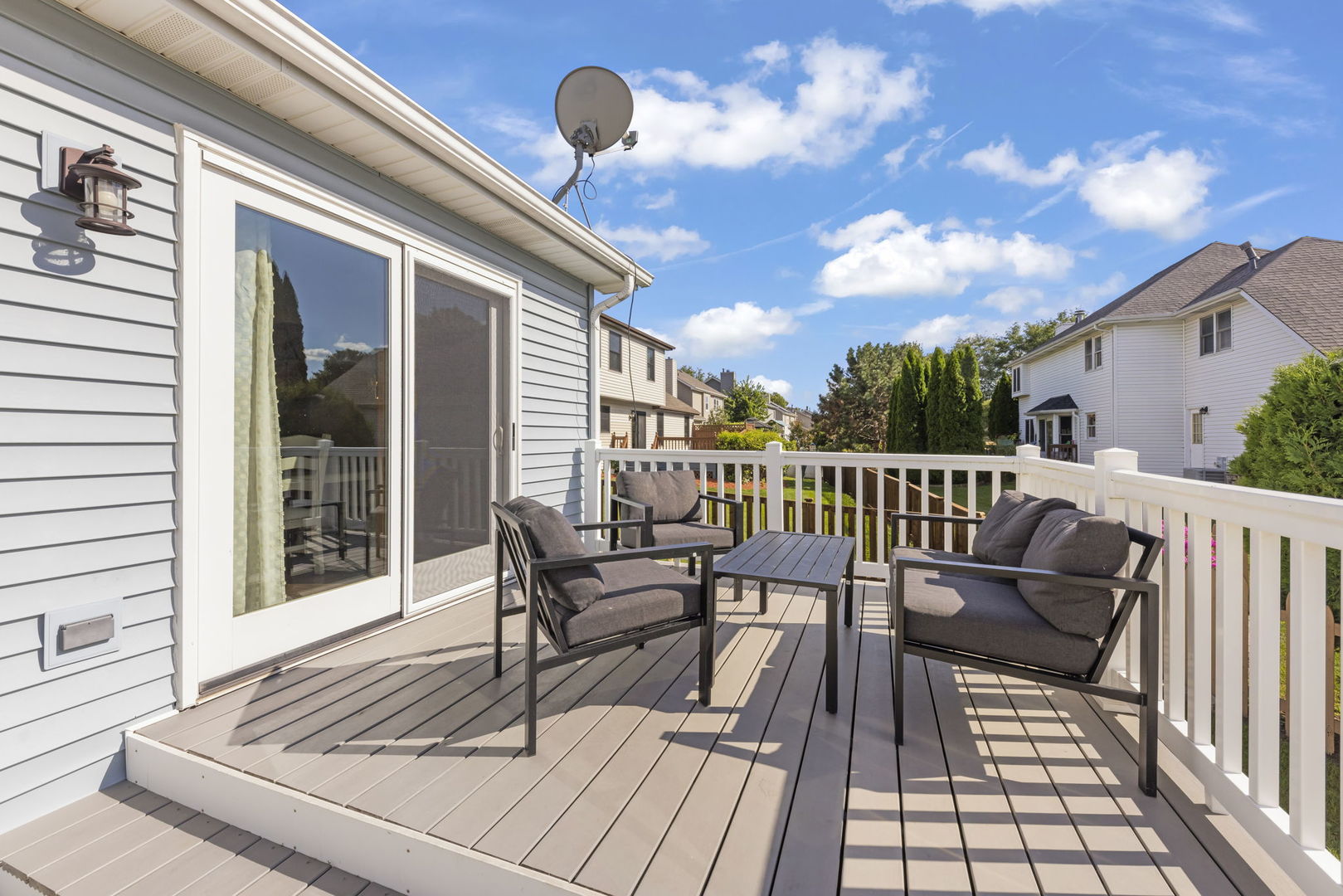 1801 Chestnut Hill Road Plainfield, IL 60586 - Photo 17 of 24 a view of a chairs and table on the deck