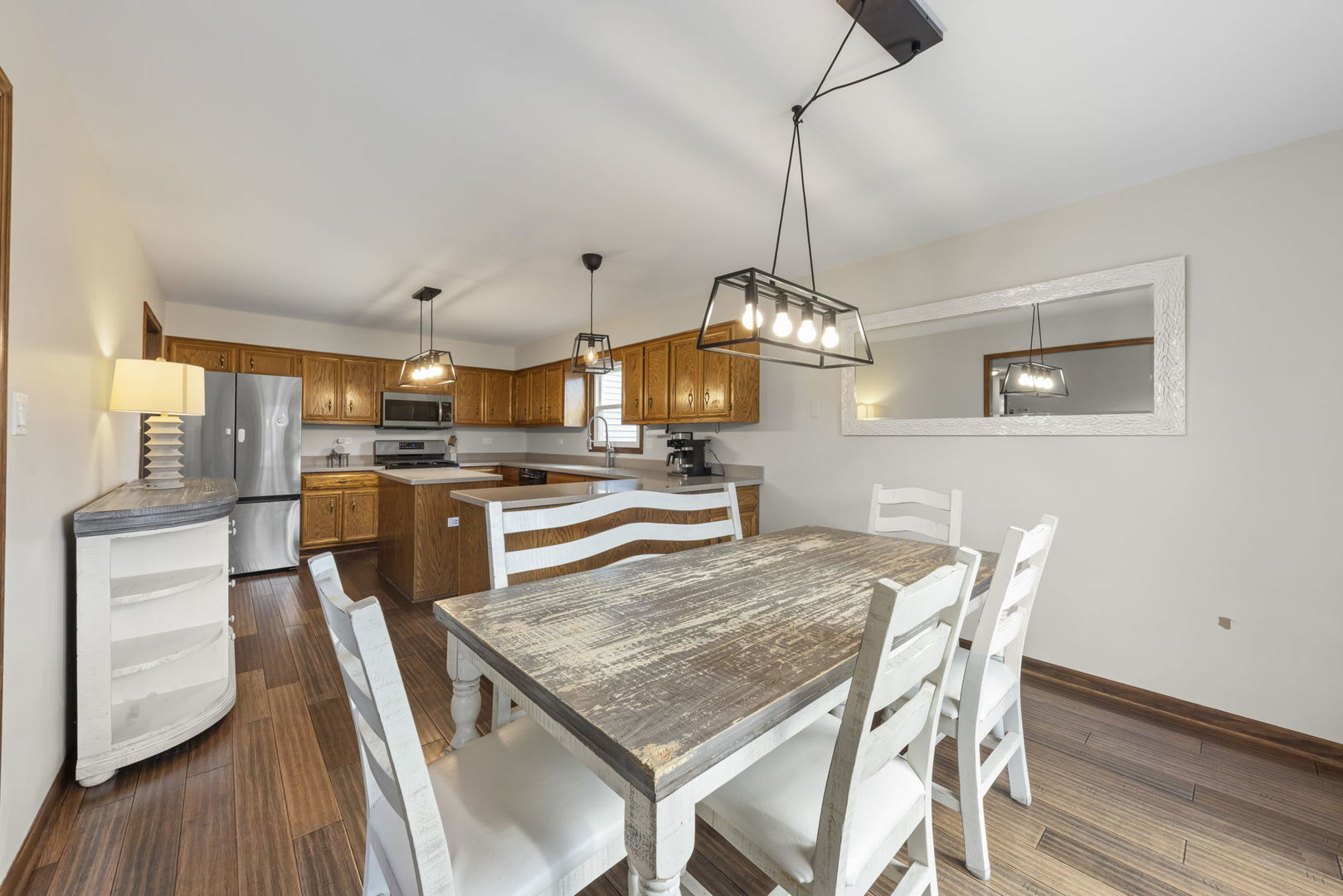 1801 Chestnut Hill Road Plainfield, IL 60586 - Photo 5 of 24 a dining room with furniture and wooden floor