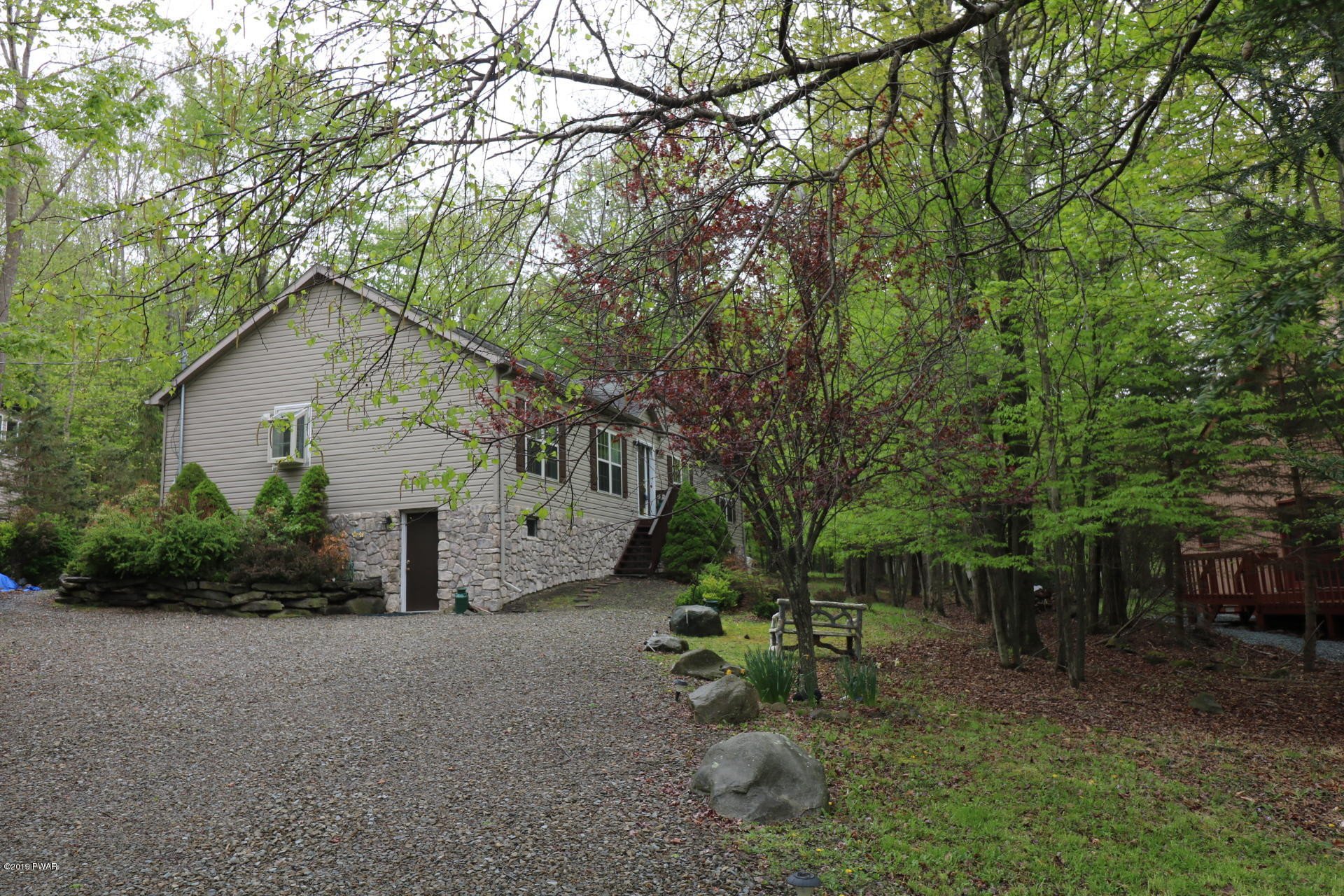 1271 Brookfield Road Lake Ariel, PA 18436 - Photo 8 of 143 a front view of a house with a yard and tree s