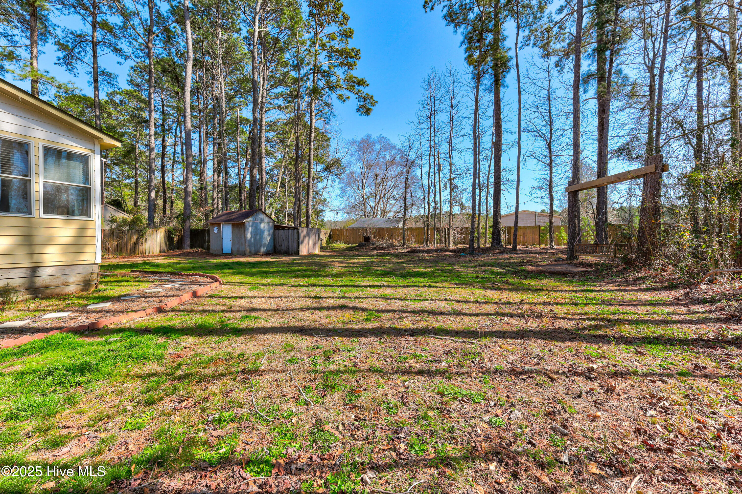 74 North Drive Rocky Point, NC 28457 - Photo 33 of 38 74 North Drive-print-032-035-Side Yard-4