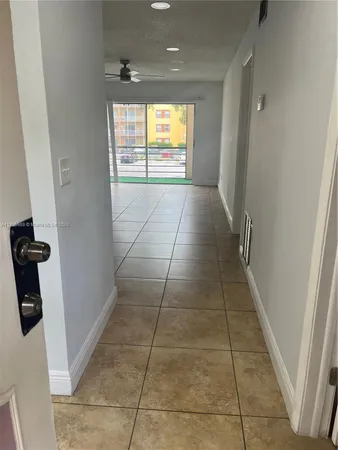 a kitchen with a stove and a microwave