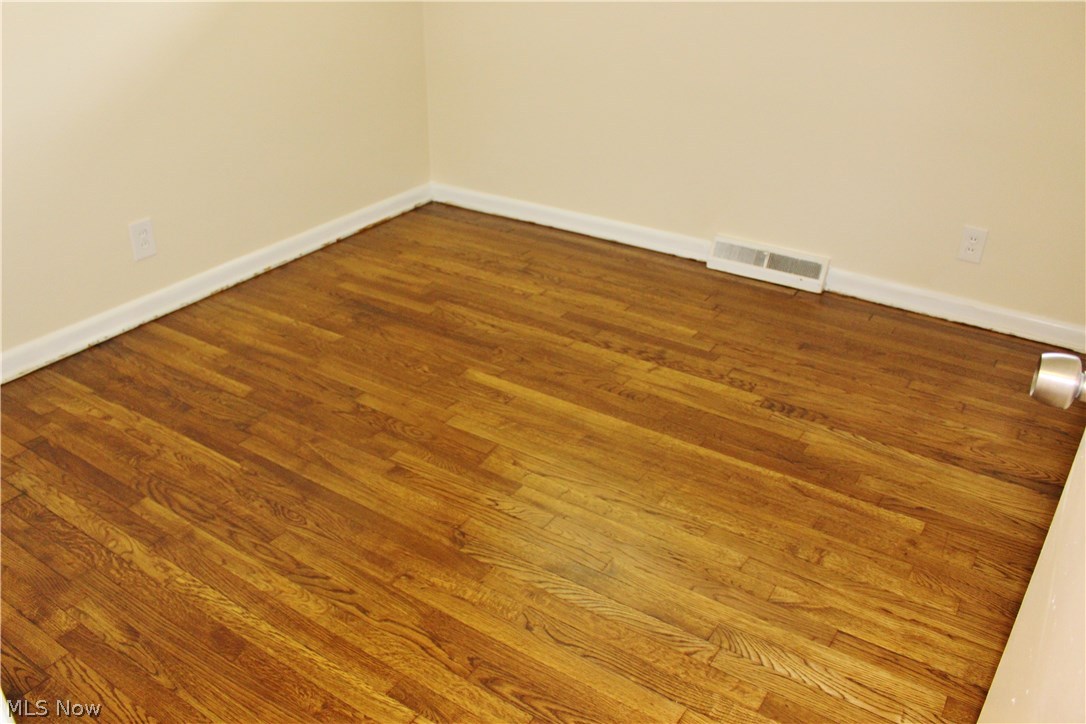 10702 Chillicothe Road Kirtland, OH 44094 - Photo 17 of 25 Just finished hardwood floor in the 2nd bedroom.